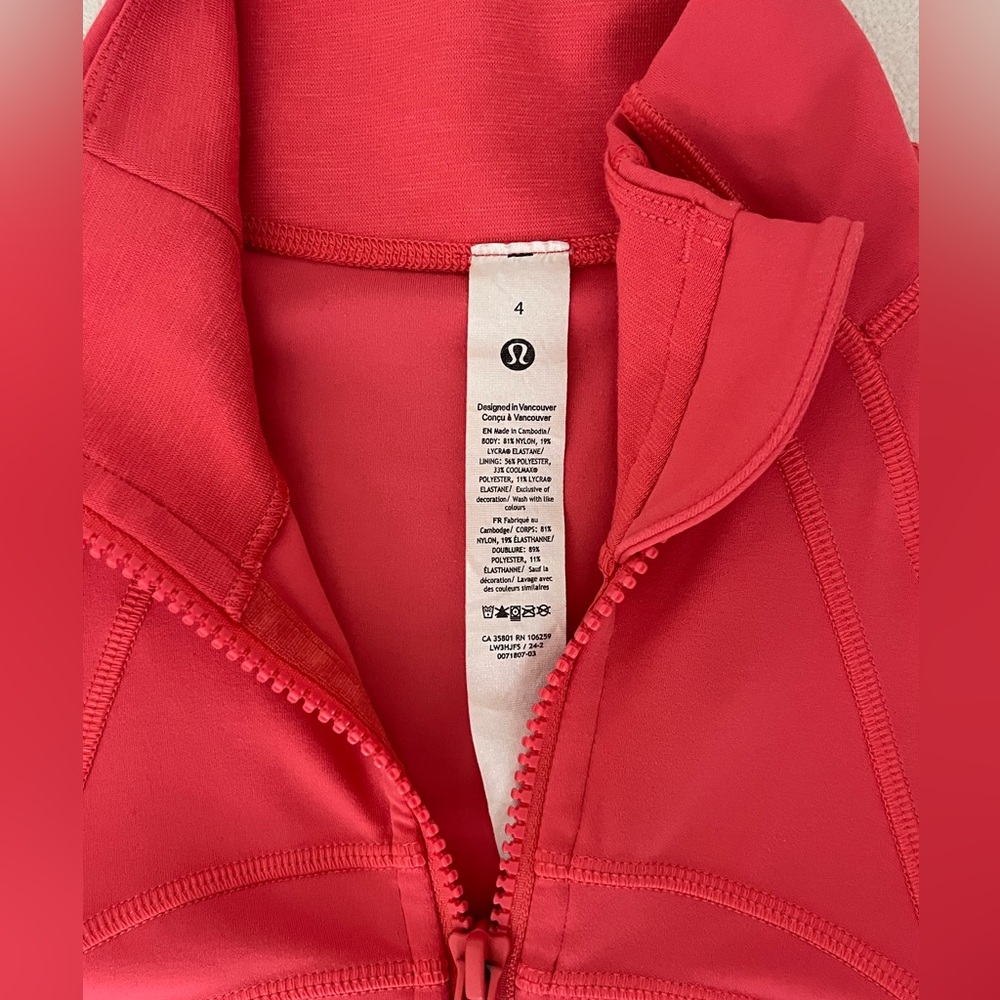 Vibrant pink Lululemon zip up define jacket